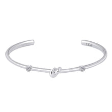 Load image into Gallery viewer, Love Knot Bracelet with White Topaz | Aquamarine  This simple design is handcrafted with Sterling Silver to convey the message of eternal love.  Sterling Silver   White Topaz: 2.5mm  Aquamarine: 2.5mm