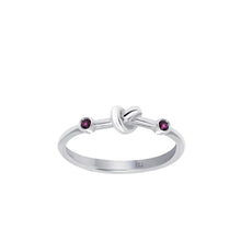 Load image into Gallery viewer, Love Knot Ring with Red Rubies  Handcrafted with Sterling Silver and a Rubies on each side of the Love Knot. As the most elegant of all gems, the energy of the Red Ruby stimulates passion, protection and love for others and oneself.