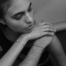 Load image into Gallery viewer, Love Knot Bracelet | Men. Love Knot collection is inspired by the tradition of never-ending love symbolizing the unity and bond between lovers. By following her design concept of simplicity, Erica represents this strong meaning of the Love Knot by using Silver and Gemstones to convey the message of eternal love.