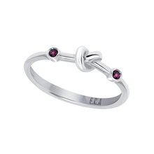 Load image into Gallery viewer, Love Knot Ring with Red Rubies  Handcrafted with Sterling Silver and a Rubies on each side of the Love Knot. As the most elegant of all gems, the energy of the Red Ruby stimulates passion, protection and love for others and oneself.
