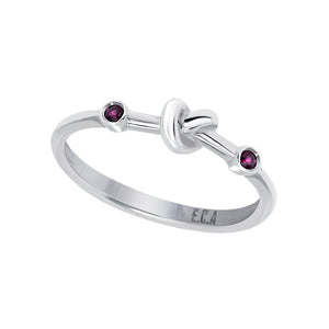 Love Knot Ring with Red Rubies  Handcrafted with Sterling Silver and a Rubies on each side of the Love Knot. As the most elegant of all gems, the energy of the Red Ruby stimulates passion, protection and love for others and oneself.